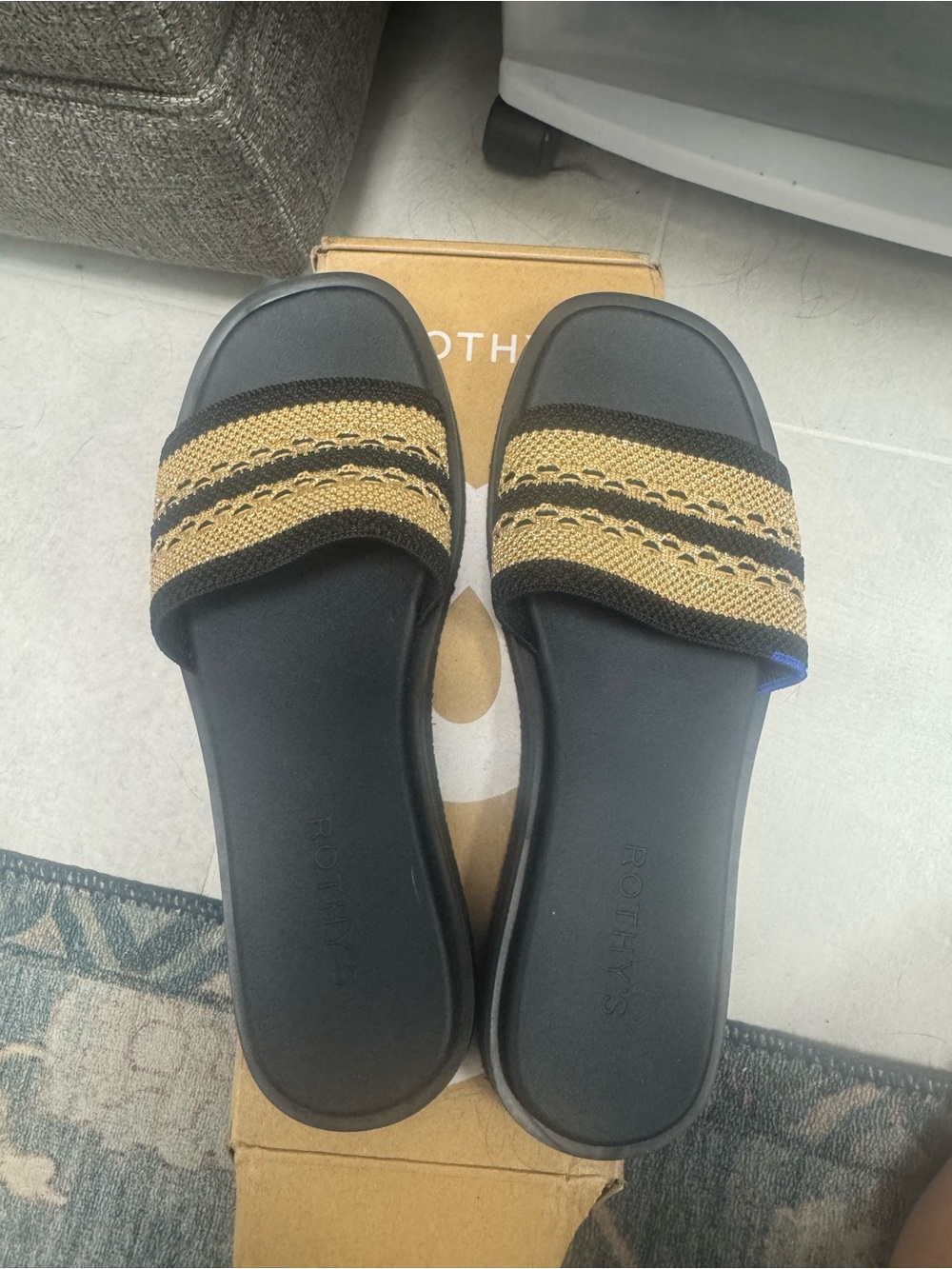 Rothy's Black Slide Sandals with Gold Woven Straps
